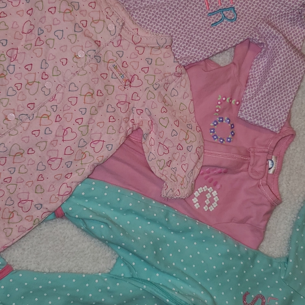 Lot of 4 0-3 month sleepers. Carters gerber